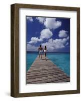 Couple Running on Dock, Curacao, Caribbean-Greg Johnston-Framed Photographic Print