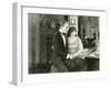 Couple Sitting on Edge of Couch-null-Framed Photo