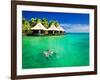 Couple Snorkling in Tropical Lagoon with over Water Bungalows-Martin Valigursky-Framed Photographic Print