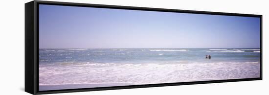 Couple Standing in Water on the Beach, Gulf of Mexico, Florida, USA-null-Framed Stretched Canvas