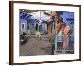 Couple Standing Outside Blue Painted Residential Haveli, Old City, Jodhpur, Rajasthan State, India-Eitan Simanor-Framed Photographic Print