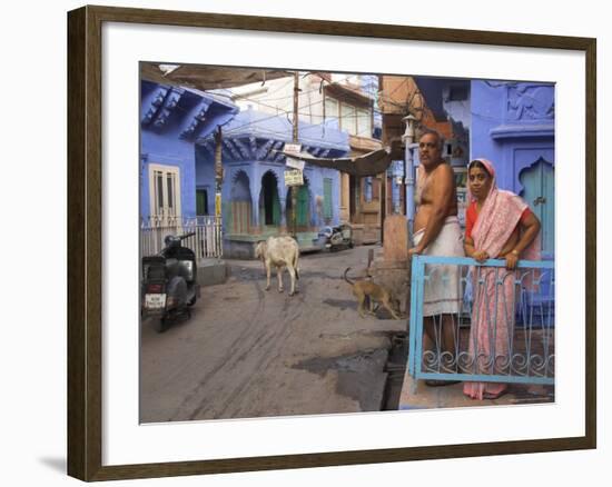 Couple Standing Outside Blue Painted Residential Haveli, Old City, Jodhpur, Rajasthan State, India-Eitan Simanor-Framed Photographic Print