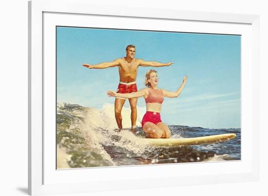Couple Surfing-null-Framed Art Print