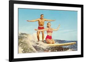 Couple Surfing-null-Framed Art Print