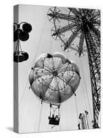 Couple Taking a Ride on the 300 Ft. Parachute Jump at Coney Island Amusement Park-Marie Hansen-Stretched Canvas