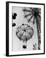 Couple Taking a Ride on the 300 Ft. Parachute Jump at Coney Island Amusement Park-Marie Hansen-Framed Photographic Print