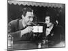 Couple Toasting with Mugs-null-Mounted Photo