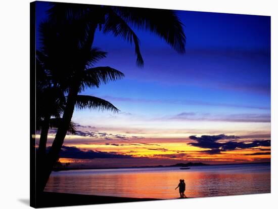 Couple Walking Along Beach at Sunset, Fiji-Peter Hendrie-Stretched Canvas