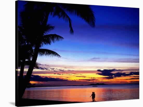Couple Walking Along Beach at Sunset, Fiji-Peter Hendrie-Stretched Canvas