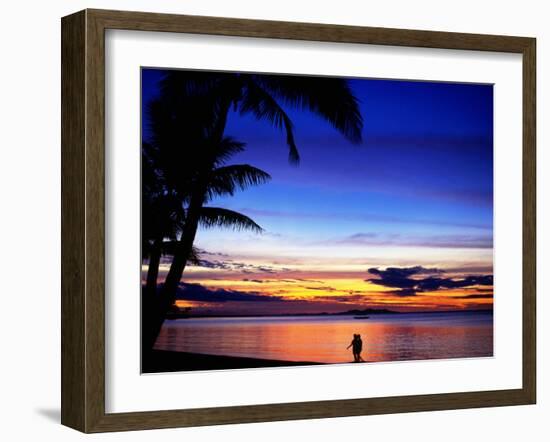 Couple Walking Along Beach at Sunset, Fiji-Peter Hendrie-Framed Photographic Print