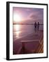 Couple Walking Along Beach at Sunset, Nassau, Bahamas, Caribbean-Greg Johnston-Framed Photographic Print