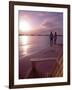 Couple Walking Along Beach at Sunset, Nassau, Bahamas, Caribbean-Greg Johnston-Framed Photographic Print
