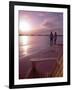 Couple Walking Along Beach at Sunset, Nassau, Bahamas, Caribbean-Greg Johnston-Framed Photographic Print