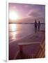 Couple Walking Along Beach at Sunset, Nassau, Bahamas, Caribbean-Greg Johnston-Framed Photographic Print