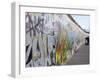 Couple Walking Along the East Side Gallery Berlin Wall Mural, Berlin, Germany, Europe-Simon Montgomery-Framed Photographic Print