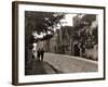 Couple Walking Down a Quiet Cobbled Road in Rye Sussex-null-Framed Photographic Print