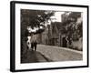 Couple Walking Down a Quiet Cobbled Road in Rye Sussex-null-Framed Photographic Print