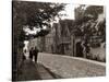Couple Walking Down a Quiet Cobbled Road in Rye Sussex-null-Stretched Canvas