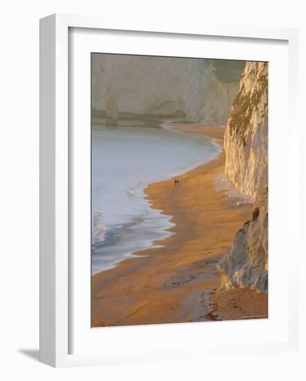 Couple Walking on Beach. Isle of Purbeck, Dorset, England UK-Jean Brooks-Framed Photographic Print