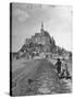 Couple Walking on Causeway Toward Mont Saint Michel-Ralph Morse-Stretched Canvas