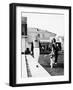 Couple Walking their St. Bernard Outside their Home-null-Framed Photo