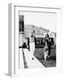 Couple Walking their St. Bernard Outside their Home-null-Framed Photo