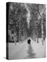 Couple Walking Through a Snow Covered Road-Carl Mydans-Stretched Canvas