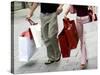 Couple Walking with Shopping Bags on Konigsallee, Dusseldorf, North Rhine Westphalia, Germany-Yadid Levy-Stretched Canvas