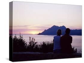Couple Watching Sunset Near Porto, Corsica, France, Mediterranean-Yadid Levy-Stretched Canvas