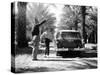 Couple with a 1955 Chevrolet Townsman Station Wagon, (C1955)-null-Stretched Canvas