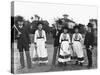 Couples Standing on Tennis Court-null-Stretched Canvas