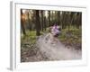 Courtney Feldt Mountain Bikes on Singletrack of the Whitefish Trail Near Whitefish, Montana, Usa-Chuck Haney-Framed Photographic Print