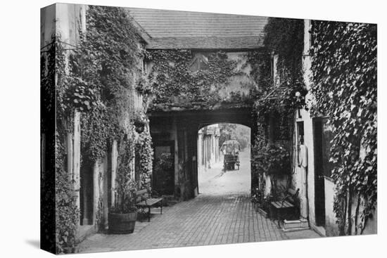 Courtyard of the Saracen's Head Inn, Southwell, Nottinghamshire, 1924-1926-null-Stretched Canvas