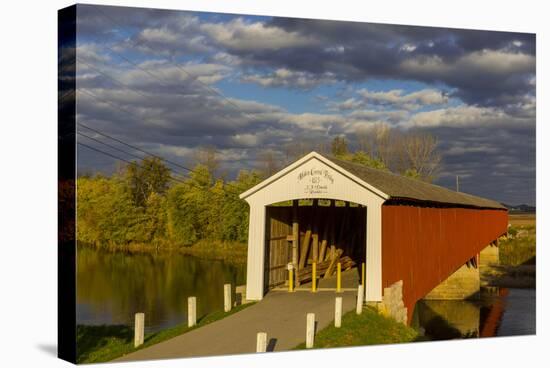 Covered Bridge over the East Fork of the White River, Medora, Indiana-Chuck Haney-Stretched Canvas