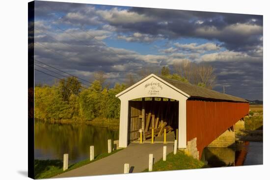 Covered Bridge over the East Fork of the White River, Medora, Indiana-Chuck Haney-Stretched Canvas
