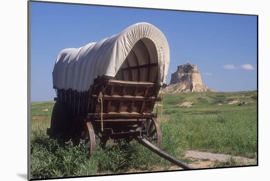 Covered Wagon on the Prairie Crossing of Oregon Trail and Mormon Trail Near Scotts Bluff, Nebraska-null-Mounted Photographic Print