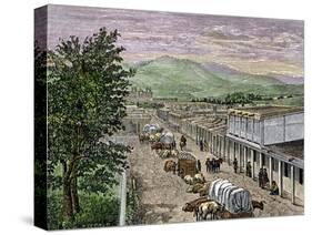 Covered Wagons at the Plaza, the End of Santa Fe Trail in New Mexico-null-Stretched Canvas