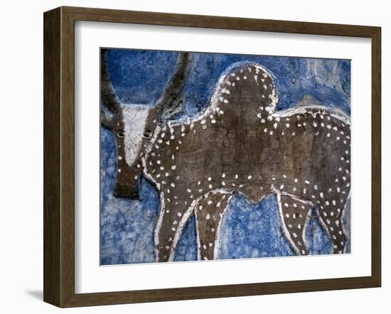 Cow on a Graveyard Headstone near an Oromo village, Ethiopia-Janis Miglavs-Framed Premium Photographic Print