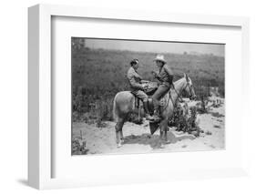 Cowboy and Businessman Playing Checkers on Horseback-null-Framed Photo