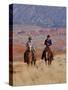 Cowboy and Cowgirl Riding Through Scenic Hills of the Big Horn Mountains, Shell, Wyoming, USA-Joe Restuccia III-Stretched Canvas