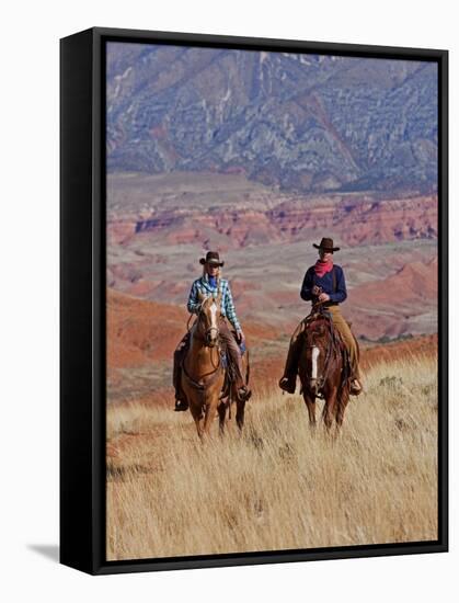 Cowboy and Cowgirl Riding Through Scenic Hills of the Big Horn Mountains, Shell, Wyoming, USA-Joe Restuccia III-Framed Stretched Canvas