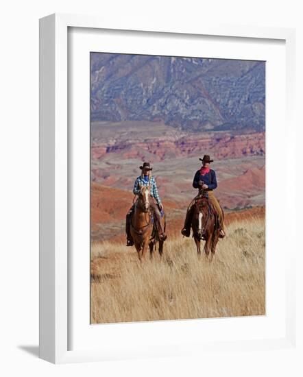 Cowboy and Cowgirl Riding Through Scenic Hills of the Big Horn Mountains, Shell, Wyoming, USA-Joe Restuccia III-Framed Photographic Print