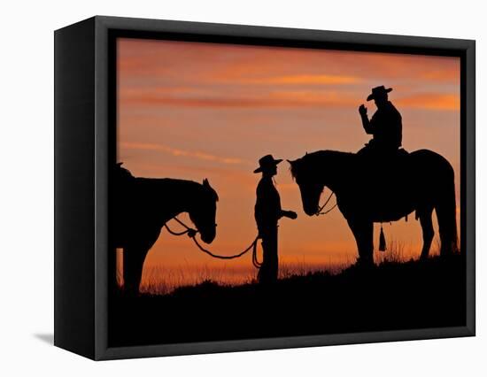 Cowboy and Cowgirl Silhouetted on a Ridge in the Big Horn Mountains, Wyoming, USA-Joe Restuccia III-Framed Stretched Canvas