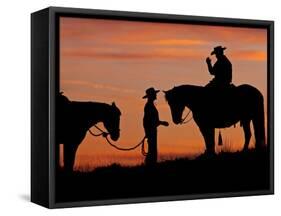 Cowboy and Cowgirl Silhouetted on a Ridge in the Big Horn Mountains, Wyoming, USA-Joe Restuccia III-Framed Stretched Canvas