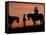 Cowboy and Cowgirl Silhouetted on a Ridge in the Big Horn Mountains, Wyoming, USA-Joe Restuccia III-Framed Stretched Canvas