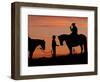 Cowboy and Cowgirl Silhouetted on a Ridge in the Big Horn Mountains, Wyoming, USA-Joe Restuccia III-Framed Photographic Print