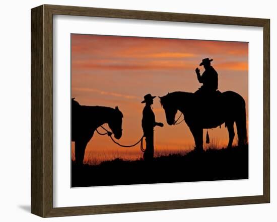 Cowboy and Cowgirl Silhouetted on a Ridge in the Big Horn Mountains, Wyoming, USA-Joe Restuccia III-Framed Photographic Print