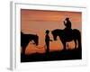 Cowboy and Cowgirl Silhouetted on a Ridge in the Big Horn Mountains, Wyoming, USA-Joe Restuccia III-Framed Photographic Print