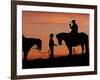 Cowboy and Cowgirl Silhouetted on a Ridge in the Big Horn Mountains, Wyoming, USA-Joe Restuccia III-Framed Photographic Print