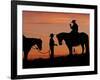 Cowboy and Cowgirl Silhouetted on a Ridge in the Big Horn Mountains, Wyoming, USA-Joe Restuccia III-Framed Photographic Print